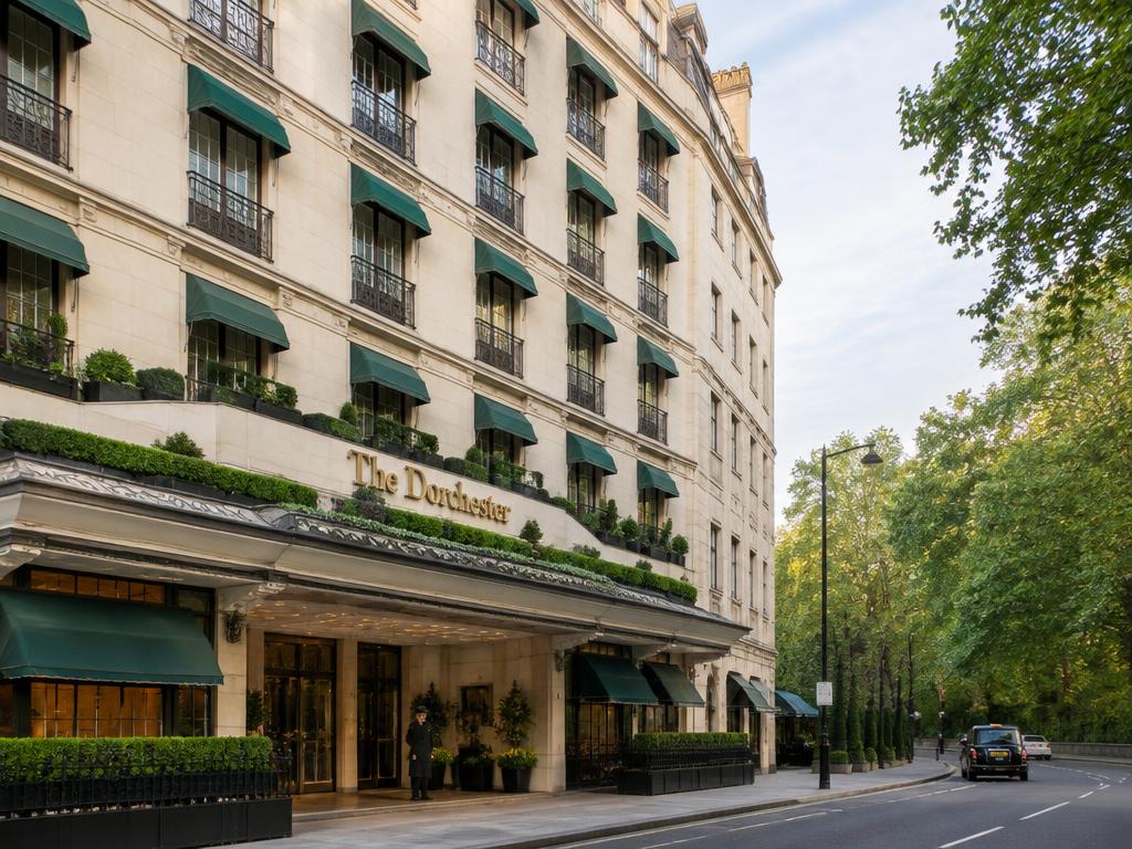 The Dorchester's Park Lane facade with green awnings opposite Hyde Park