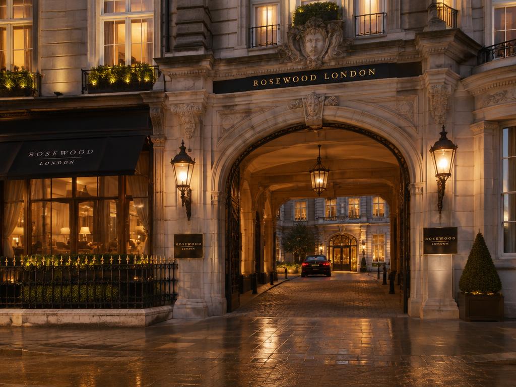 Rosewood London's Edwardian carriage archway entrance at night