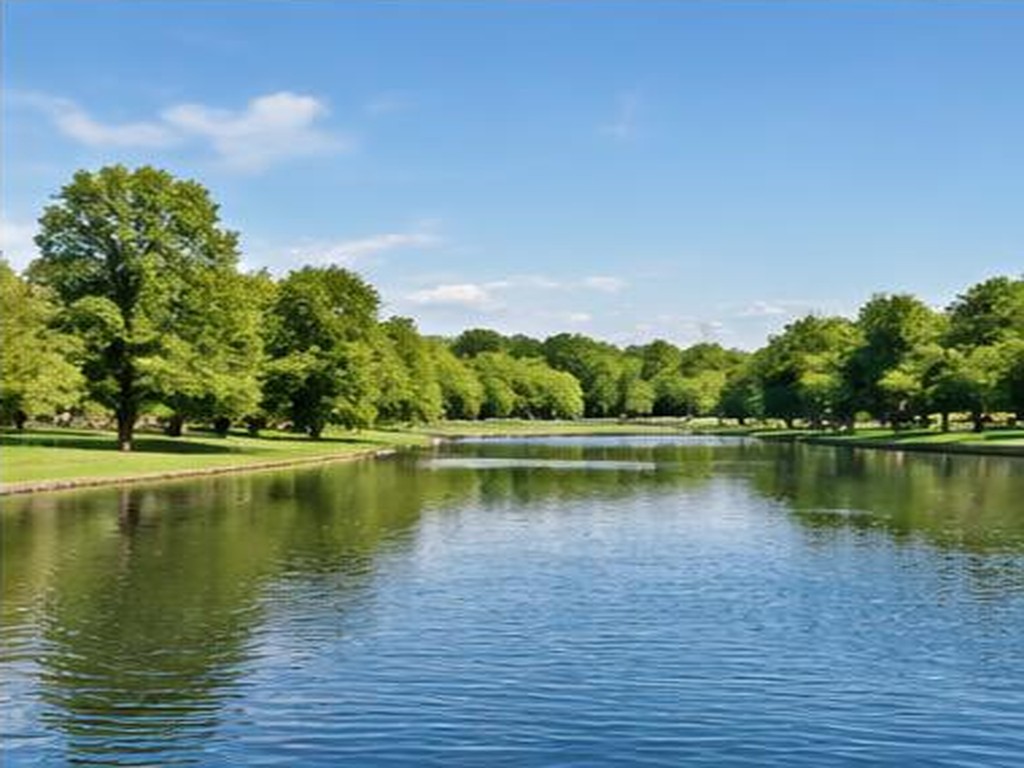 The Serpentine lake and green lawns in Hyde Park
