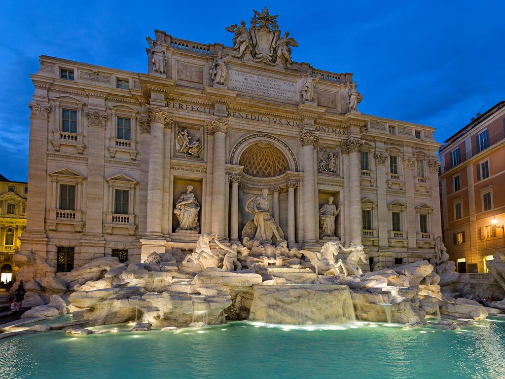 Trevi Fountain lit up at blue hour